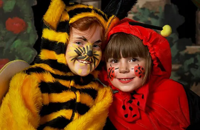 Two children dressed up as characters from the little red riding hood story.